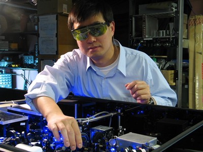 Physicist Jun Ye working on optical atomic clock