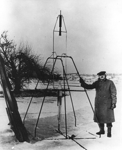 Robert Goddard with his rocket